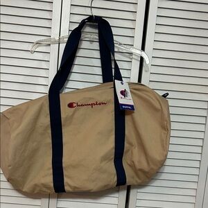 NWT Champion Beige Duffel Bag with Dark Blue Straps